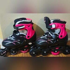 Pink and Black Adjustable Rollerblades